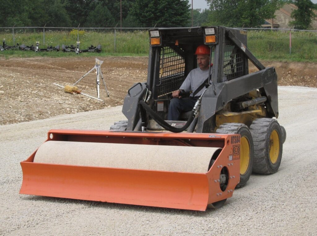 A person driving a tractor
Description automatically generated with low confidence